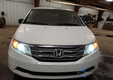 2011 Honda Odyssey Exl z USA, uszkodzony, nr VIN 5FNRL5H6XBB062076